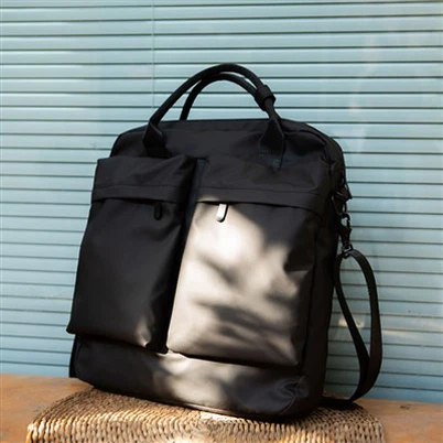 Messenger-laukku töihin